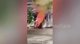 Bizarre 'flying doll' lights fireworks at Thailand funeral