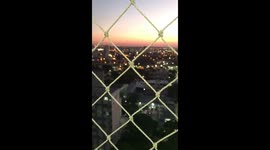 Sunset view of the 19th floor in a small city