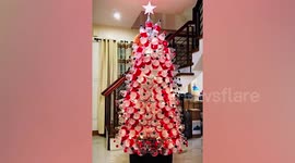 Father makes 7ft-tall flashing Christmas tree from recycled Coca-Cola bottles