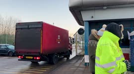 Royal Mail strike: Postmen warm themselves around fire during Arctic Blast