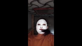 Removing the face mask in a funny way right into your phone's camera!