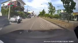 Stray wheel bounces into oncoming BMW on road in Thailand