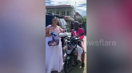 Bride's wedding hilariously interrupted with unexpected delivery during money dance
