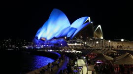 Opera House lights up blue to commemorate Qld police officers killed in shooting, Sydney, Australia