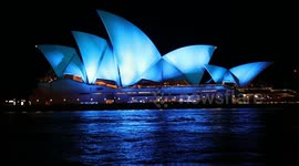 Sydney Opera House lights up blue in tribute to officers killed in Wieambilla shooting