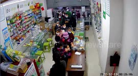 Crowds rush into pharmacy to get medicines as China eases COVID restrictions