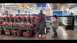 Purchasing New Gifts And Toys For Children In Need After Visiting The Angel Tree