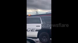 Woman shocked as she looks at tornado damage in North Texas, US