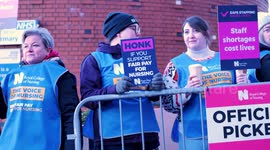 Nurses on Strike! Mixed emotions at the picket line at Leeds General Infirmary, West Yorkshire, during industrial action