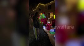 US couple decorate front garden with dozens of donated inflatables they receive from strangers