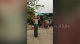 Funny pet parrot refuses to leave owner holding bowl of food