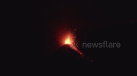 continuously erupting of volcano during the night. 4K