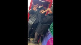 Scavenger Hunt - Squeeze in! Team Half-Arsed in a phone box for the Newsflare Christmas Scavenger Hunt