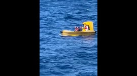 Royal Caribbean Symphony of the Seas saves stranded broken boat in the middle of the ocean