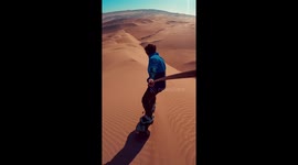 Sandboarder rides epic and spectacular dunes in the Chilean Desert