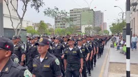 Thousands of police march through central Lima in huge show of force in anticipation of protests