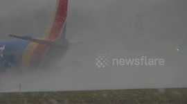 Heavy snowfall during takeoff at Rochester International Airport, US