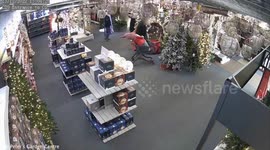 Police hunting real-life Grinch who was caught on CCTV brazenly stealing giant decorative Santa Claus