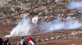 Palestinian protestors clash with Israeli soldiers at rally against establishment of Israeli outposts in Beit Dajan, east of West Bank's Nablus
