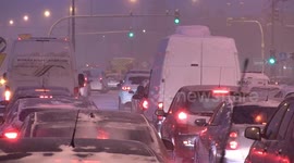 Traffic jams and snow on the road as winter cold snap hits Poland