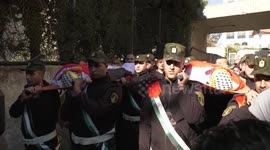 Palestinians carry bodies of Khaled Anbar and Salameh Sharay’a during funeral in West Bank