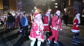Skating Santas roll through the streets of London