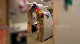 Christmas fanatic turned her office cubicle into an incredible life-size gingerbread house