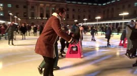 Visitors enjoy SKATE at Somerset House with Moet & Chandon in December 2022