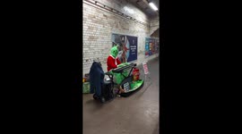 Watch the Grinch getting his groove on in Kensington tube station