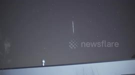 Starlink satellite train captured rising above Swiss Alps