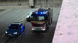 Fire Engine fights Bristol traffic responding to a major flat fire
