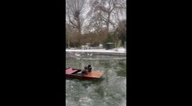 Punting on the icy river in Cambridge