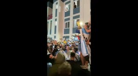 Argentina fans take over a street in Qatar to celebrate their team winning the 2022 World Cup
