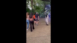 Family shares Shrieks & Laughter while walking through a scare zone at Busch Gardens