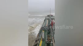 Oil tanker beached during storms that sank navy warship in southern Thailand