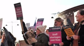 Cheering and Noisy Crowd of Nurses taking Strike Action at Leeds General Infirmary