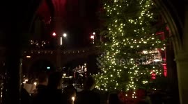 Hark The Herald by candlelight at The Mystery of Christmas carol service in the Union Chapel Islington