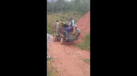 Eight men jump onto unbalanced truck to stop it from tipping over