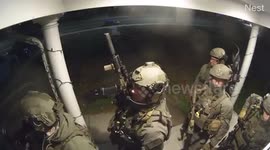 SWAT Team shows up at families door for neighbors next door! Unplugs Christmas lights to add stealth.