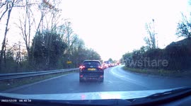 DASHCAM - VERY DANGEROUS DRIVING - Two vehicles - Overtaking queuing traffic by driving into oncoming traffic!