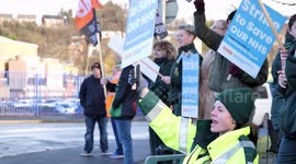 Large crowd of striking paramedics outside Leeds Ambulance Station