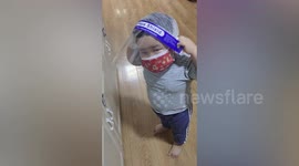 Crying boy insists on taking care of his father infected with COVID-19