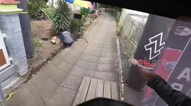 Downhill mountain bike racer has awesome ride through family LIVING ROOMS