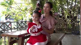 Creative mum uses plastic cup to make awesome 'Christmas tree' hair style for daughter