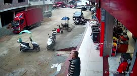 Man avoids injury after bricks falling from building skim his head
