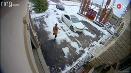 'Tis’ The Season' - Canadian woman keeps slipping over & over again on icy driveway