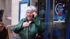 Winner of multi-billion lottery makes a call to her family after winning in Barberà del Vallès, Spain