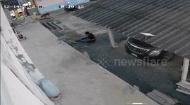 Residents slip down dangerous DIY bamboo steps outside their home