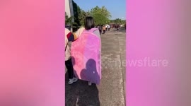 Student lugs giant backpack to school to use as sleeping bag