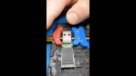 Tech guru prepares a failed usb drive for data recovery